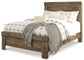 Trinell Queen Panel Bed with Dresser, Chest and 2 Nightstands